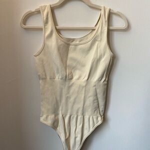 Cream OQQ bodysuit, size M